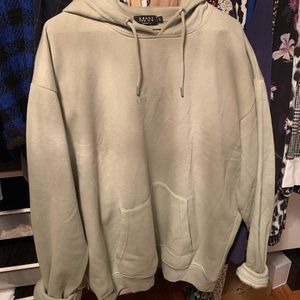 Boohoo sage green hoodie with ‘MAN’ on it